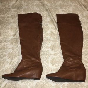 Knee high wedge boots